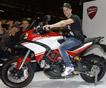 Довизиозо, Бадовини и Фогарти на стенде Ducati на EICMA 2012